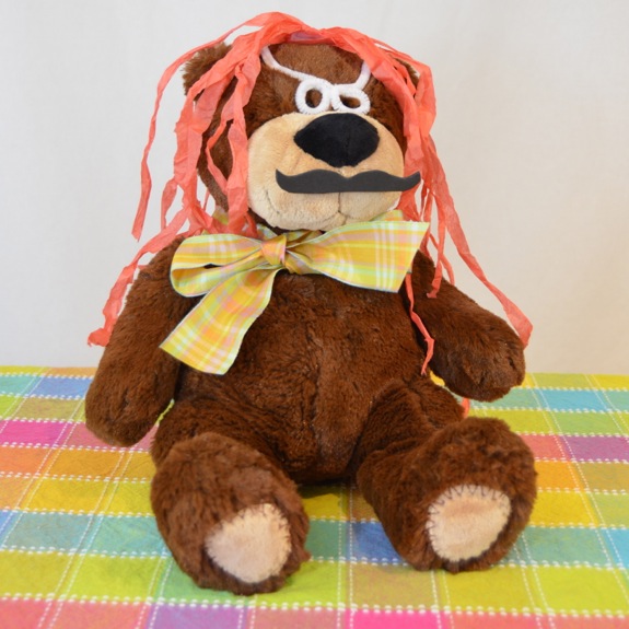 Create disguises for stuffed animal "spies".